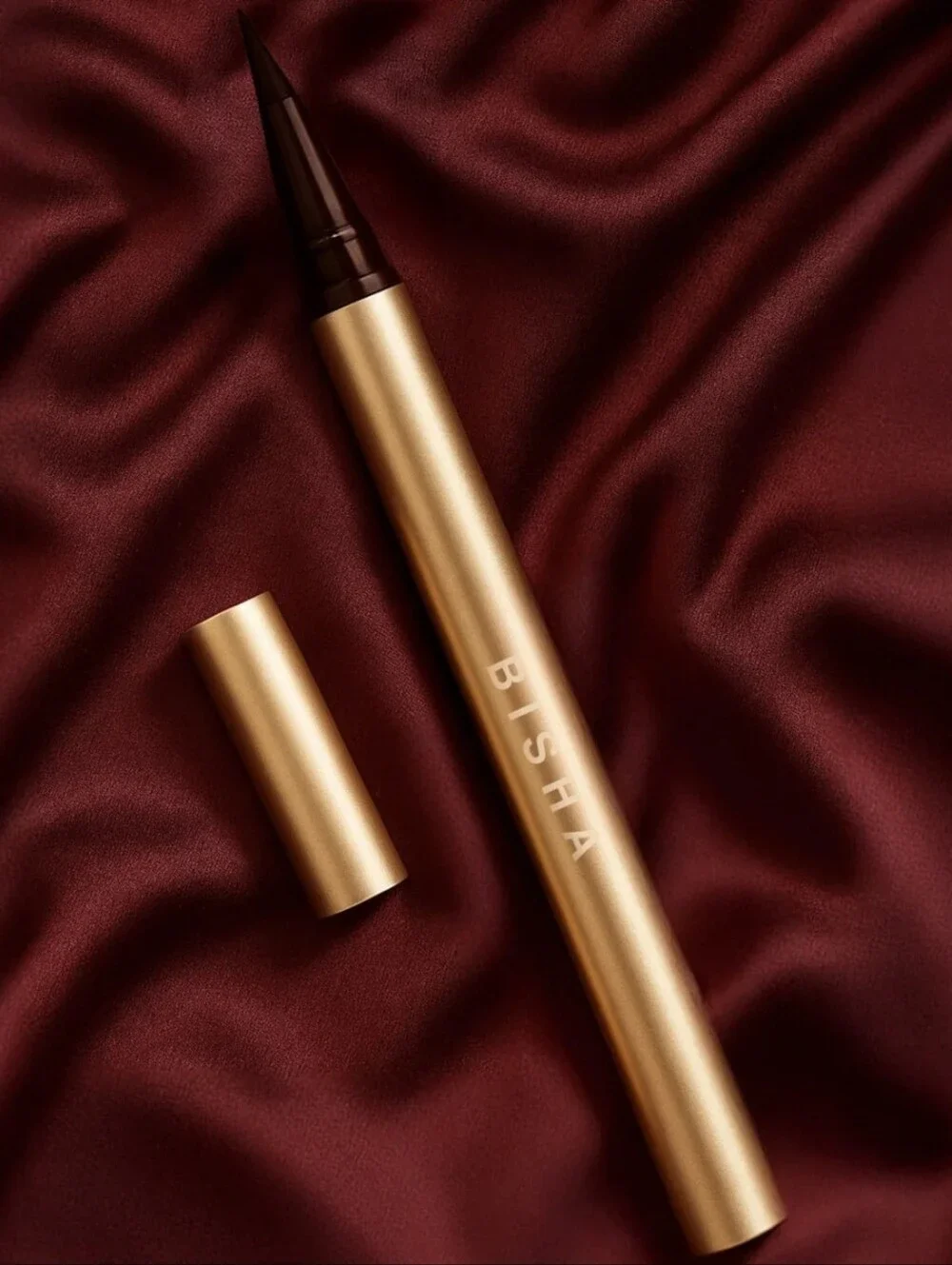 BISHA ESSENTIAL EYE DESIGNER IN UPTOWN BROWN.
